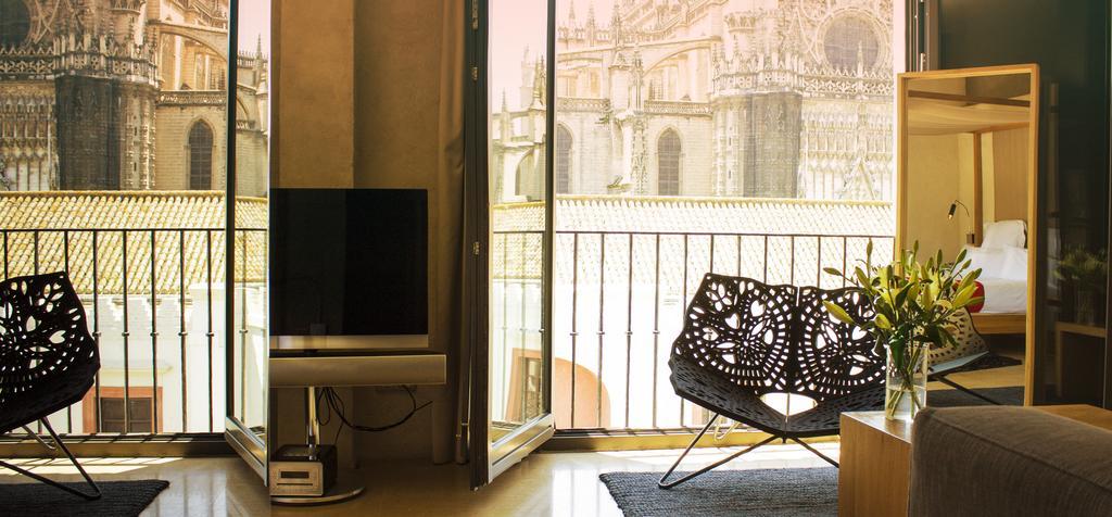 Eme Catedral Mercer Hotel Seville Luaran gambar The interior of a typical apartment