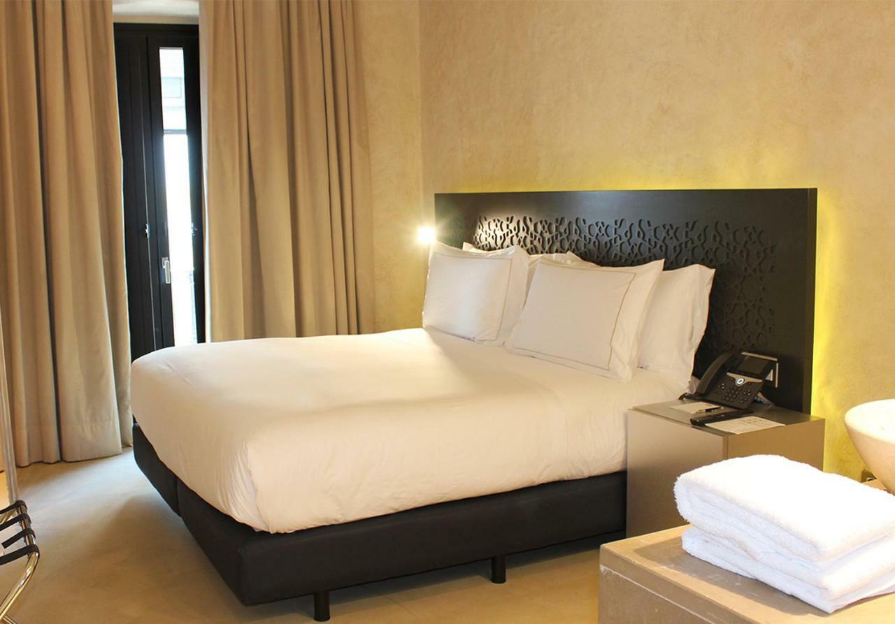 Eme Catedral Mercer Hotel Seville Luaran gambar A bedroom at the hotel
