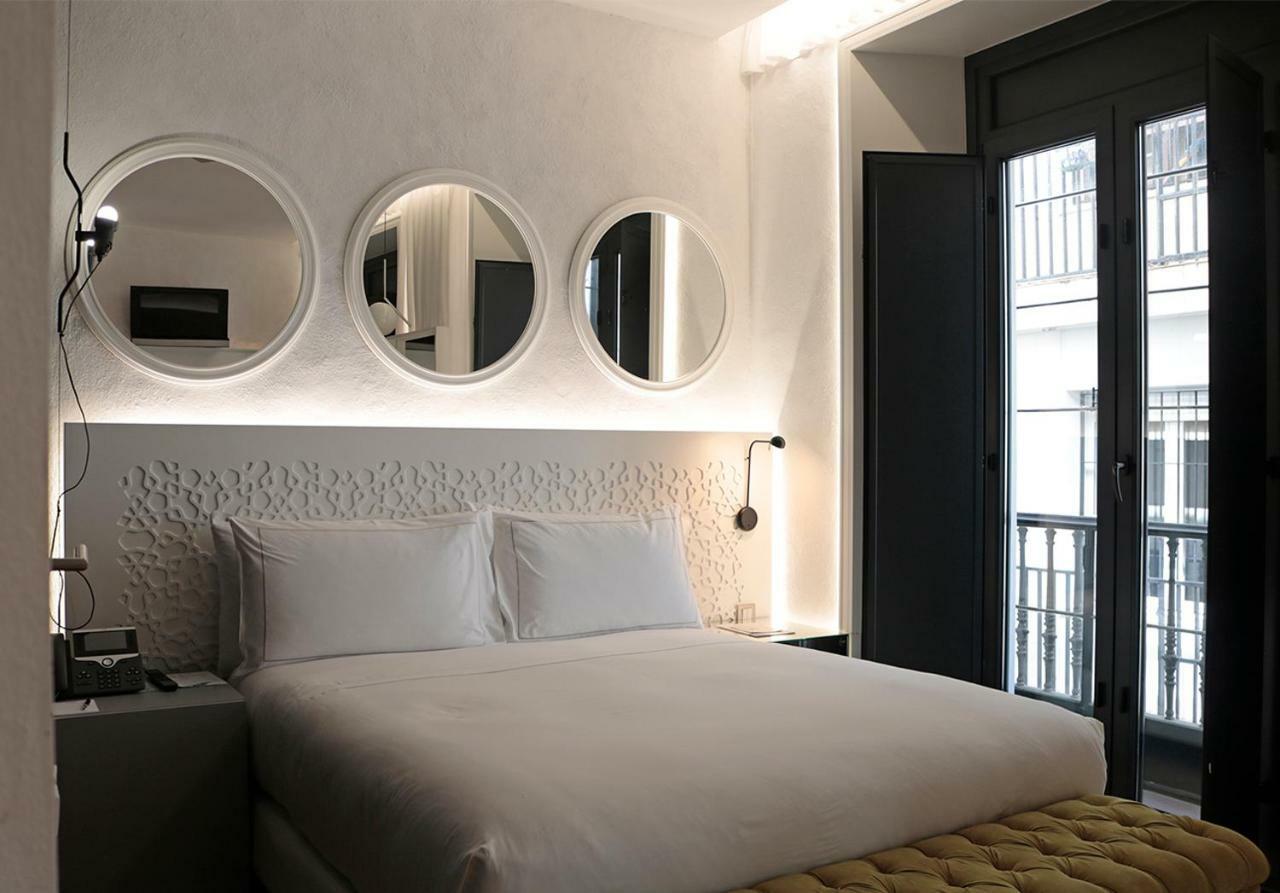 Eme Catedral Mercer Hotel Seville Luaran gambar A room at the hotel