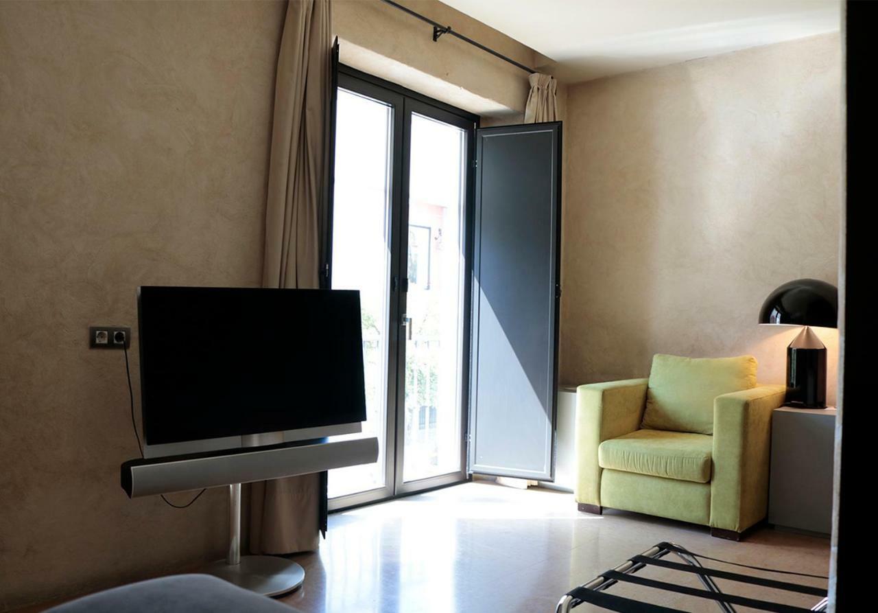 Eme Catedral Mercer Hotel Seville Luaran gambar A room at the hotel