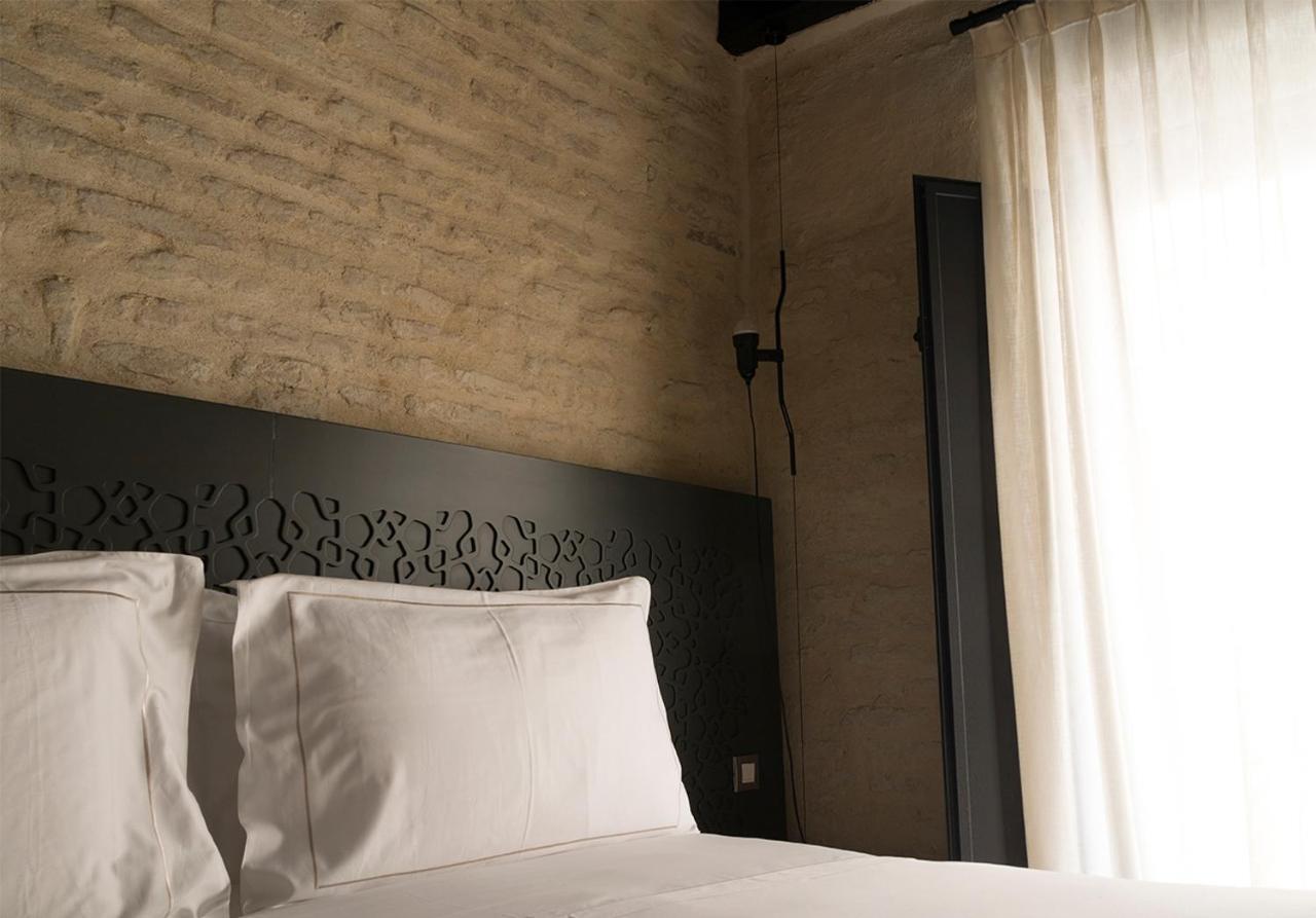 Eme Catedral Mercer Hotel Seville Luaran gambar A bedroom at the hotel